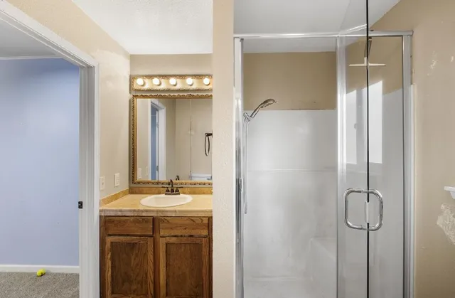 a view of a large body of water with lots of buildings in the background