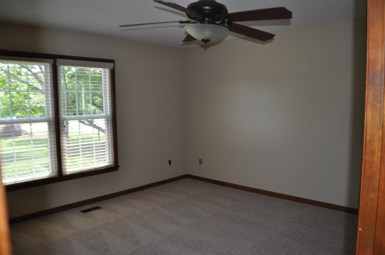 5616 Cleveland Road Clayton, NC 27520 - Photo 9 of 21 Large downstairs bedroom makes a great master retreat.