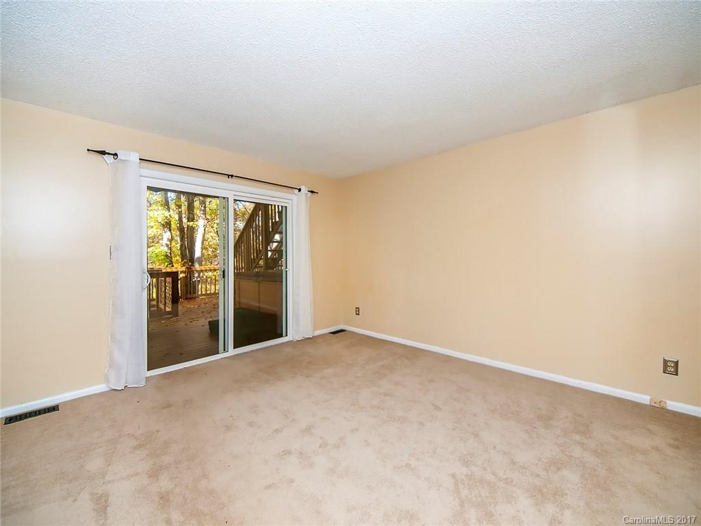 9009 Cebu Court, Unit 9 Tega Cay, SC 29708 - Photo 14 of 24 a view of an empty room with a window