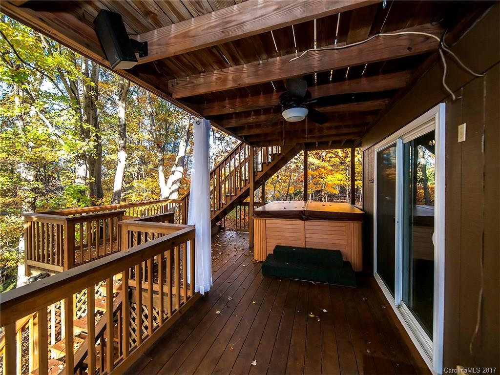 9009 Cebu Court, Unit 9 Tega Cay, SC 29708 - Photo 20 of 24 a view of balcony with wooden floor