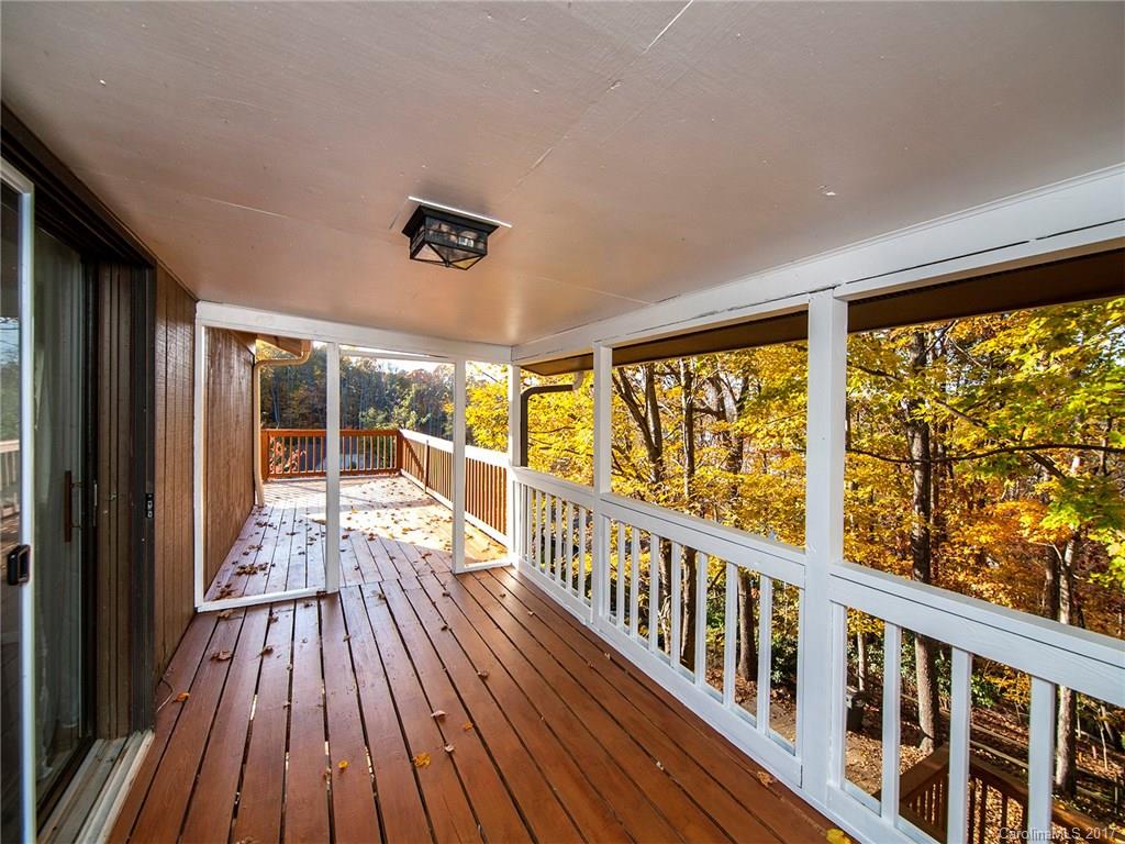 9009 Cebu Court, Unit 9 Tega Cay, SC 29708 - Photo 22 of 24 a view of two chairs in a balcony