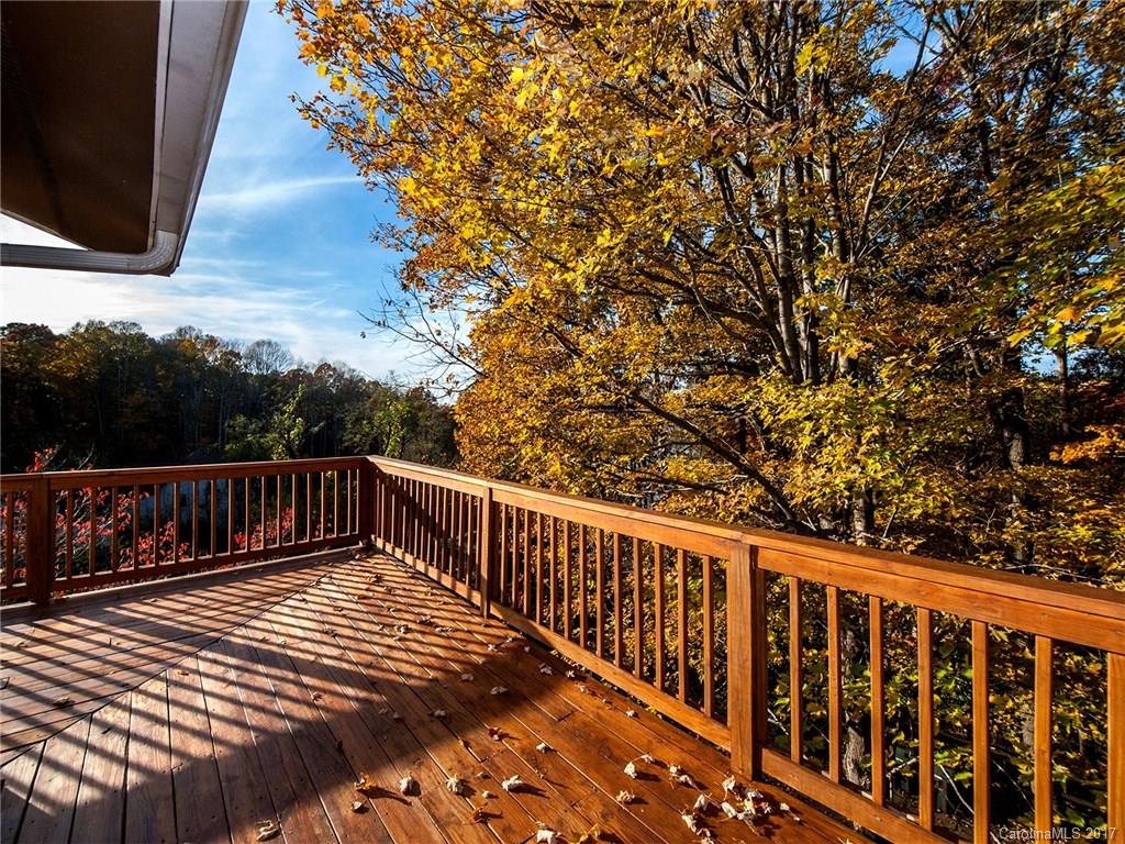 9009 Cebu Court, Unit 9 Tega Cay, SC 29708 - Photo 23 of 24 a view of balcony with wooden floor and fence
