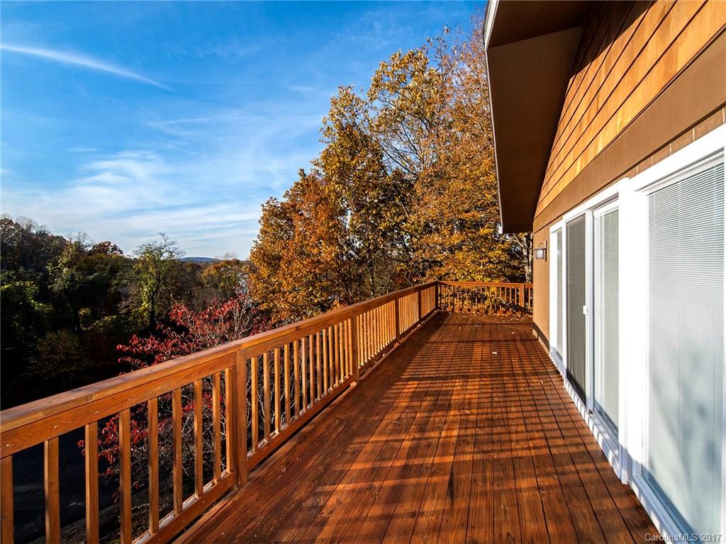 9009 Cebu Court, Unit 9 Tega Cay, SC 29708 - Photo 24 of 24 a view of a balcony with wooden floor