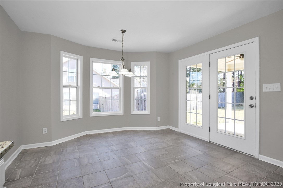 92 Holly Oak Circle Bunnlevel, NC 28323 - Photo 7 of 23 a view of an empty room with a window