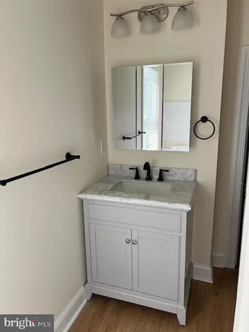 a view of a sink and a mirror