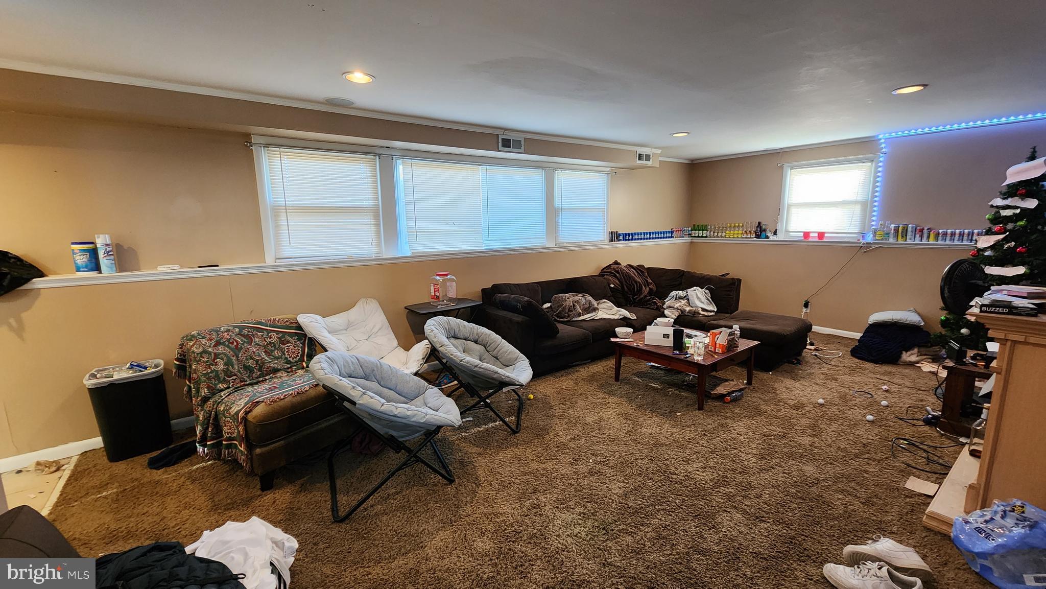 611 Whitman Street Glassboro, NJ 08028 - Photo 4 of 11 a living room with furniture a couch and a window
