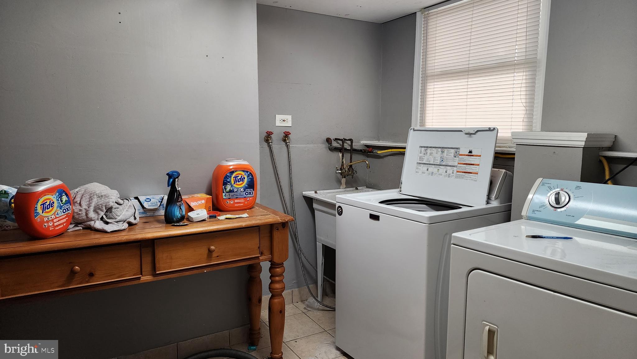 611 Whitman Street Glassboro, NJ 08028 - Photo 10 of 11 a utility room with dryer and washer