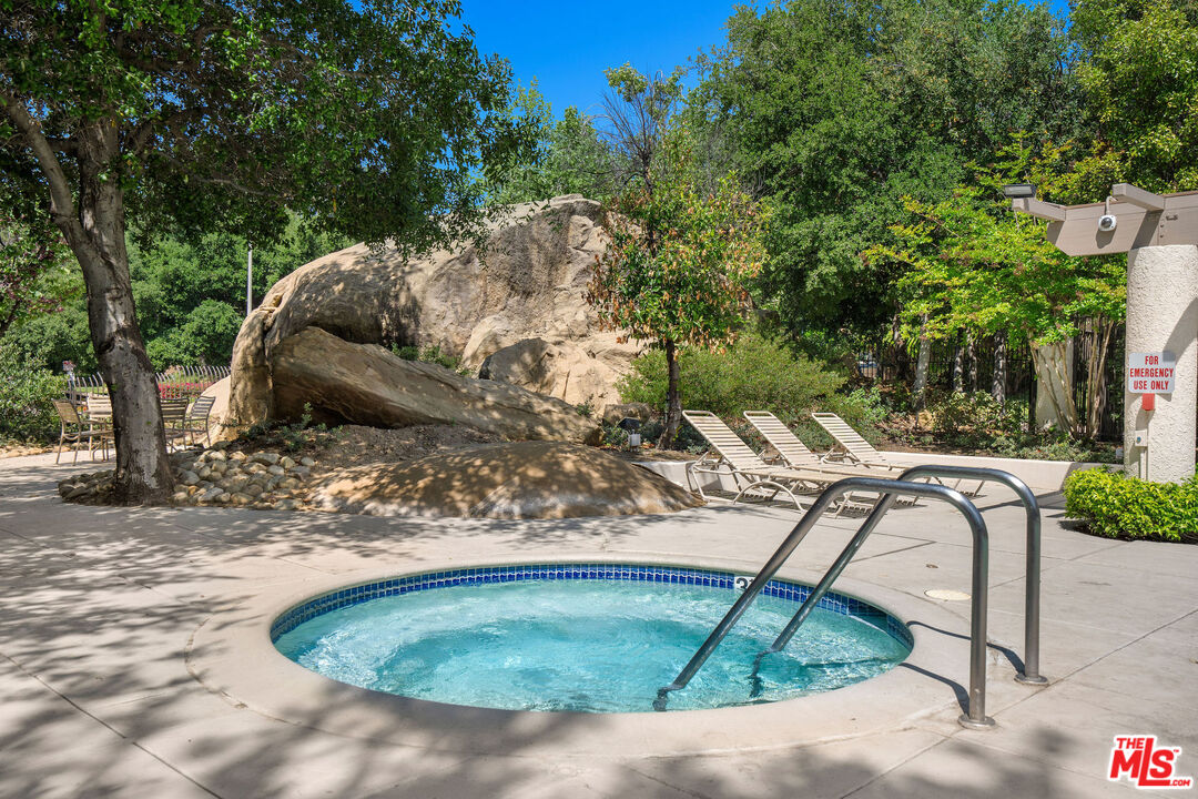22211 Frontier Place Chatsworth, CA 91311 - Photo 22 of 26 a view of a backyard
