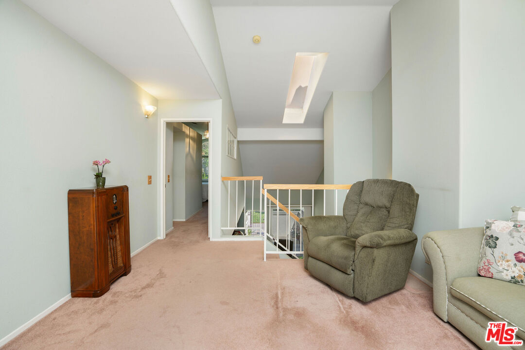 22211 Frontier Place Chatsworth, CA 91311 - Photo 10 of 26 a living room with furniture