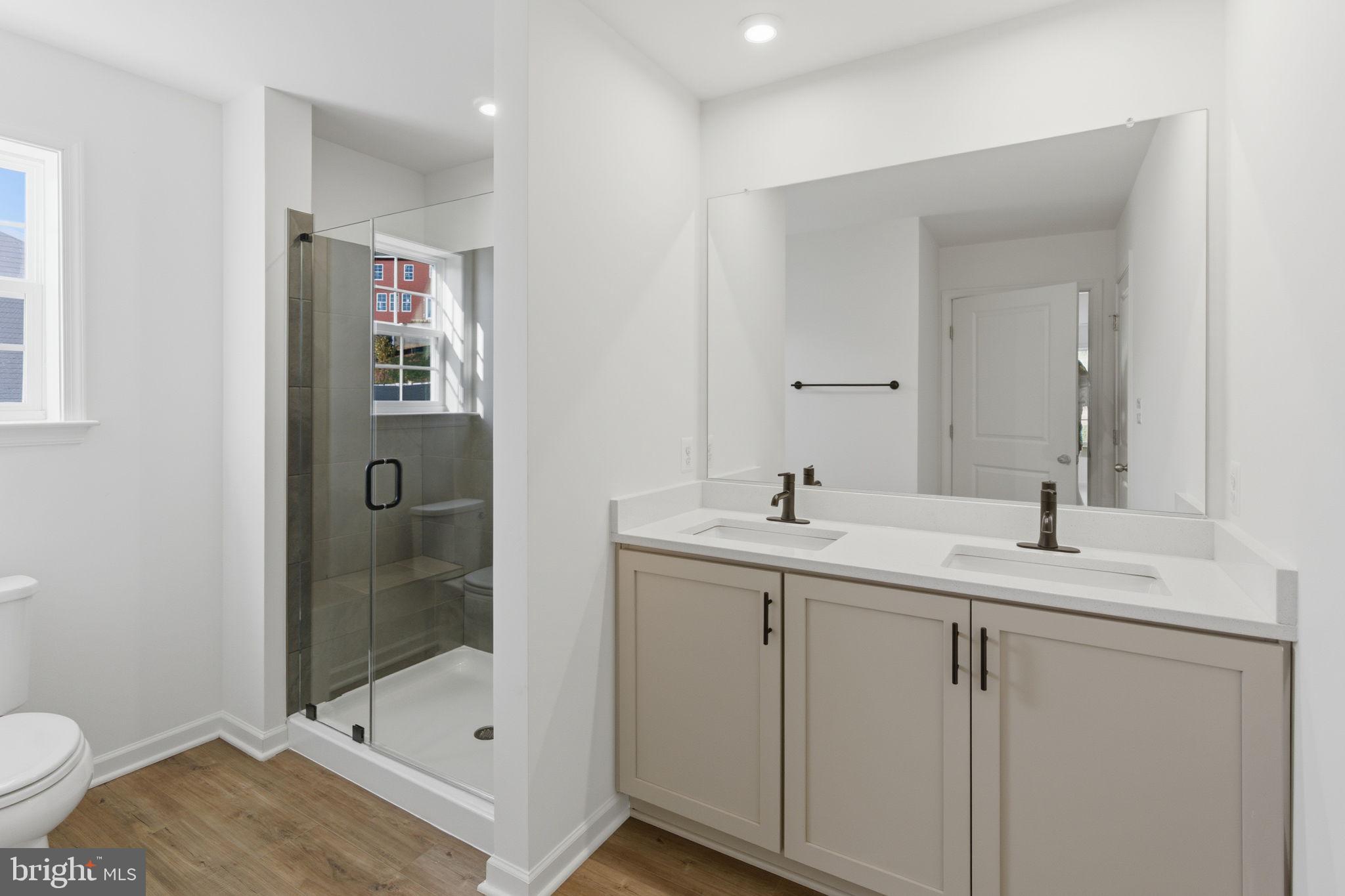 205 Pheasant Ridge Road Hanover, PA 17331 - Photo 16 of 27 a bathroom with a sink a toilet and shower