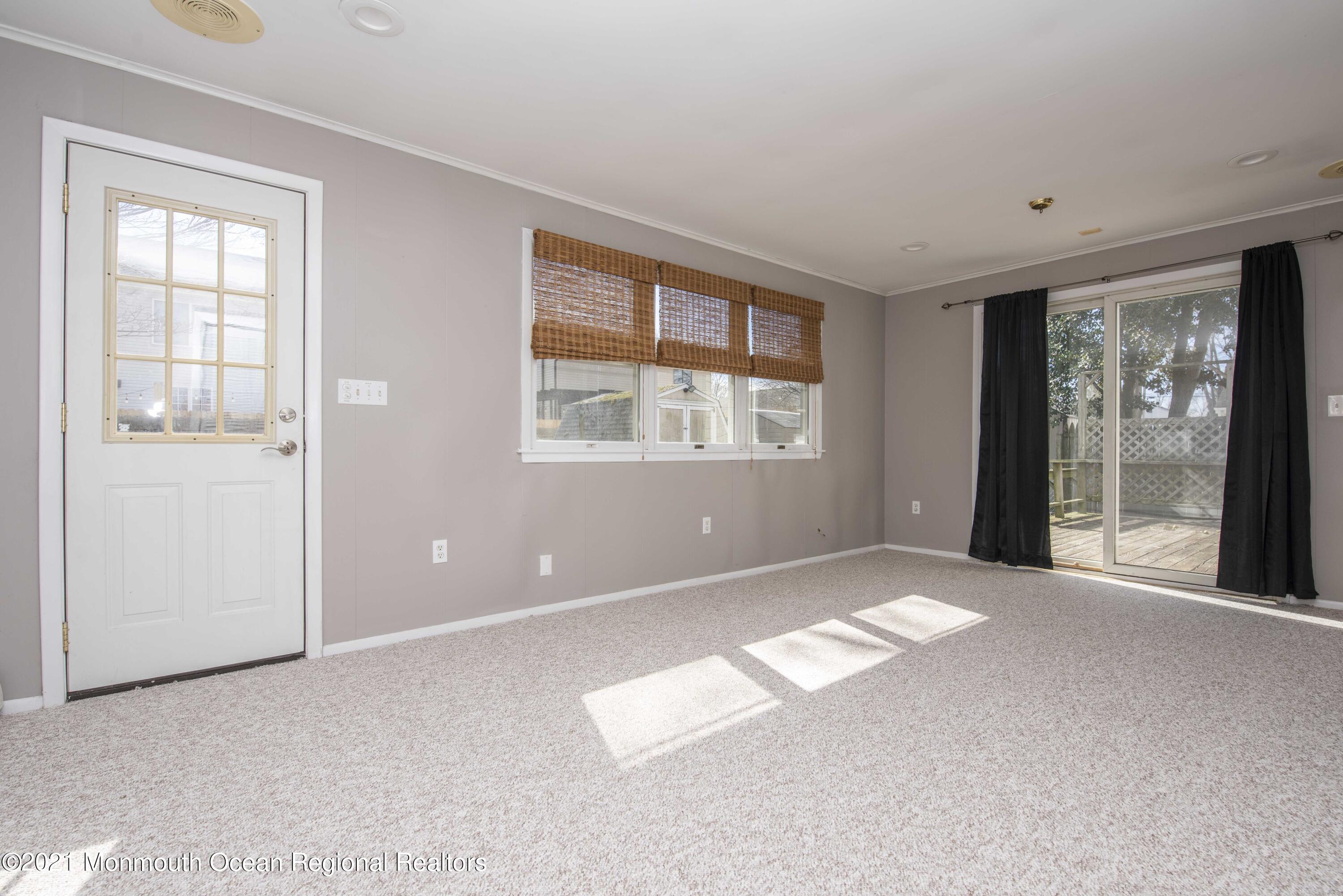 3208 Kickapoo Avenue Point Pleasant, NJ 08742 - Photo 19 of 23 an empty room with windows