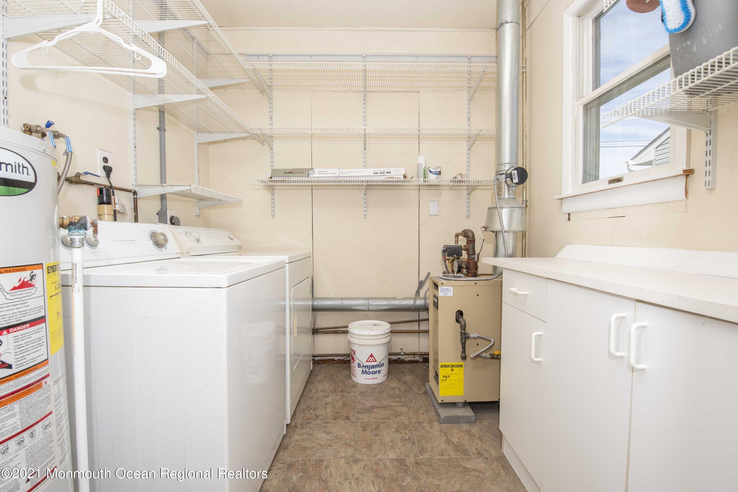 3208 Kickapoo Avenue Point Pleasant, NJ 08742 - Photo 21 of 23 a utility room with dryer and washer