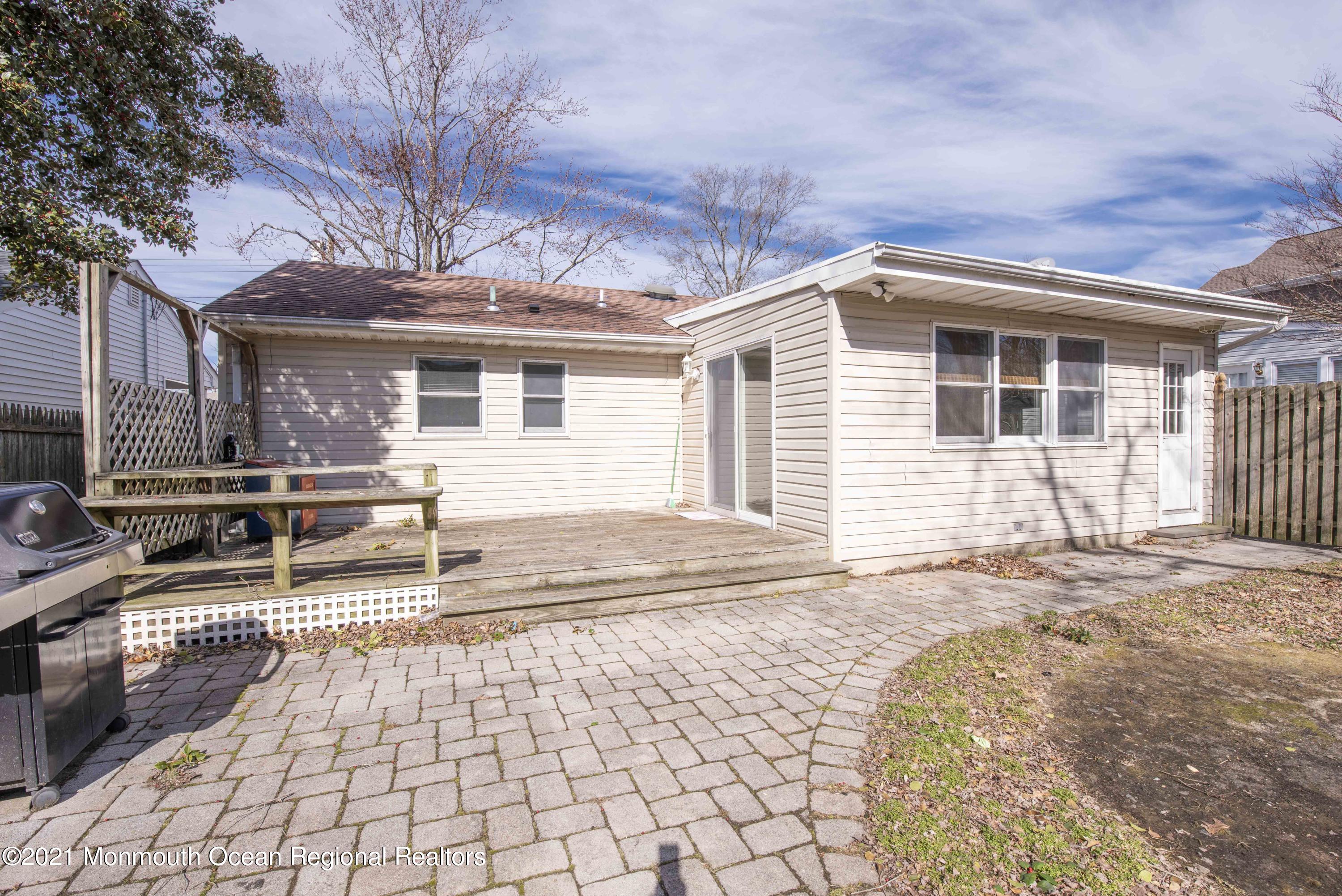 3208 Kickapoo Avenue Point Pleasant, NJ 08742 - Photo 22 of 23 a front view of a house with a patio