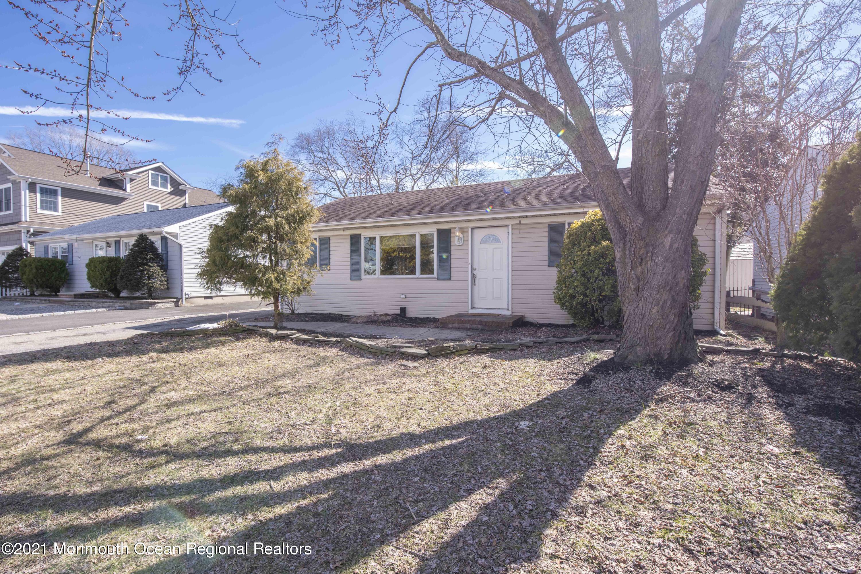 3208 Kickapoo Avenue Point Pleasant, NJ 08742 - Photo 4 of 23 a view of a house with a yard