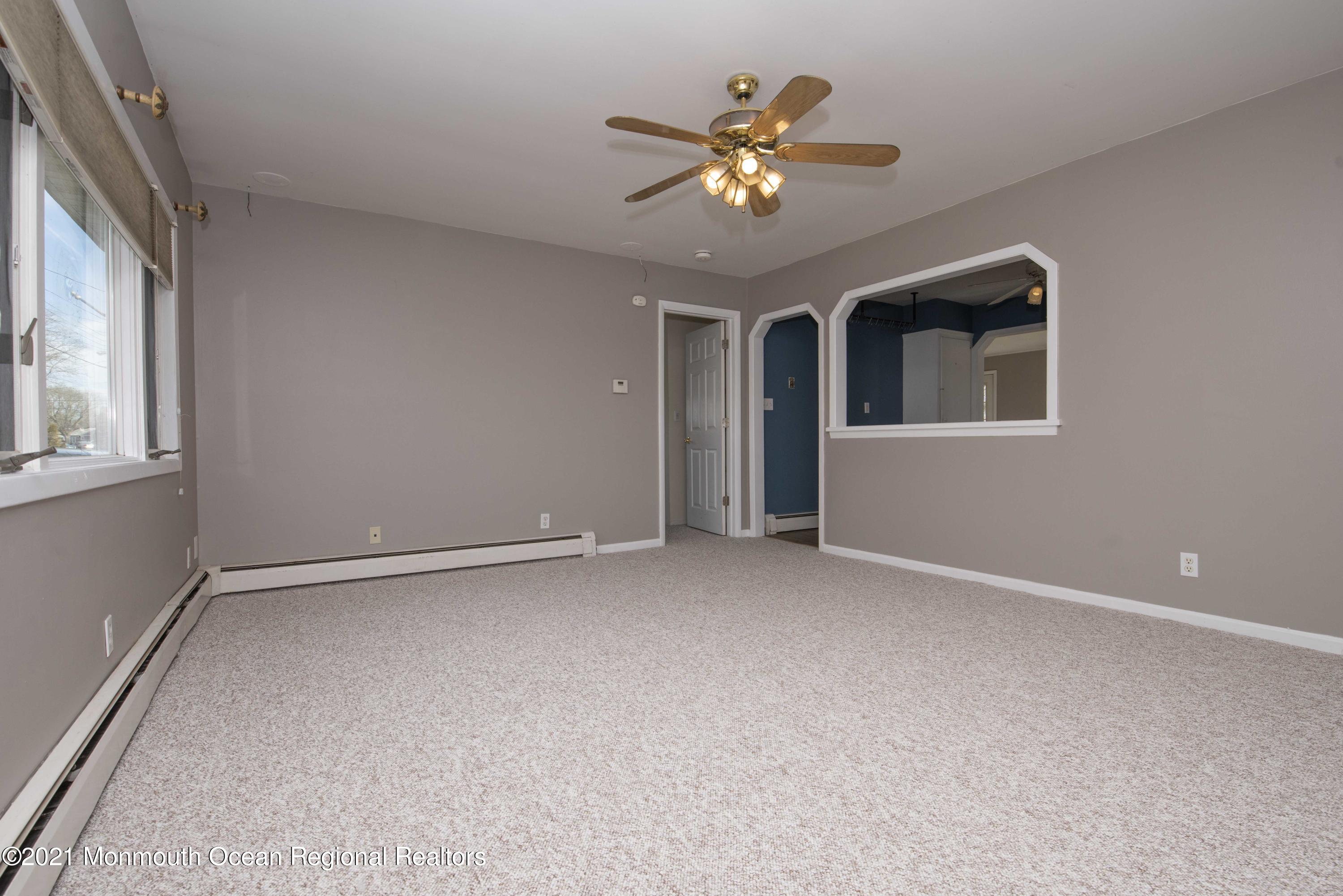 3208 Kickapoo Avenue Point Pleasant, NJ 08742 - Photo 5 of 23 a view of an empty room with chandelier fan
