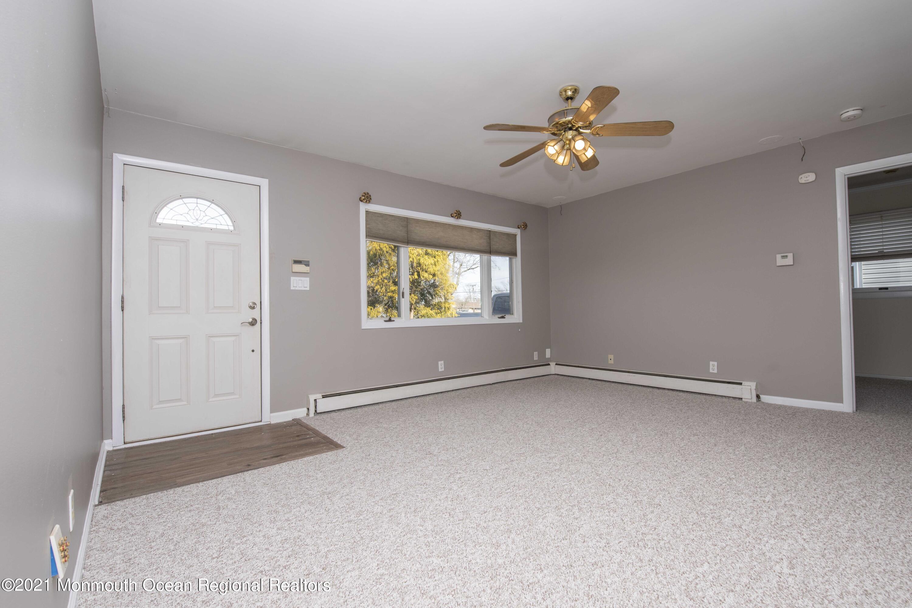 3208 Kickapoo Avenue Point Pleasant, NJ 08742 - Photo 6 of 23 a view of an empty room with a window