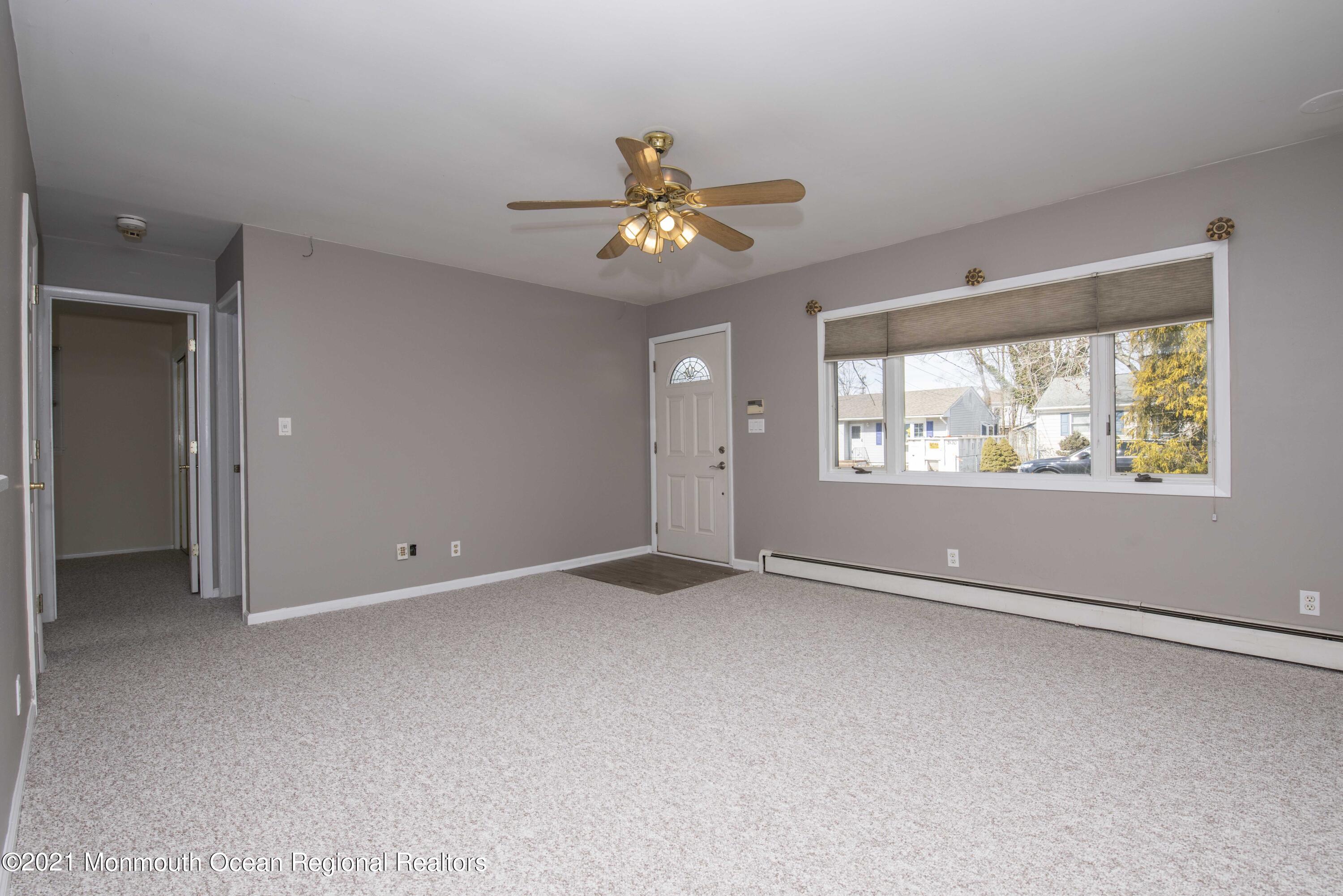 3208 Kickapoo Avenue Point Pleasant, NJ 08742 - Photo 7 of 23 a view of an empty room with a window