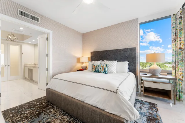 a swimming pool with outdoor seating and yard