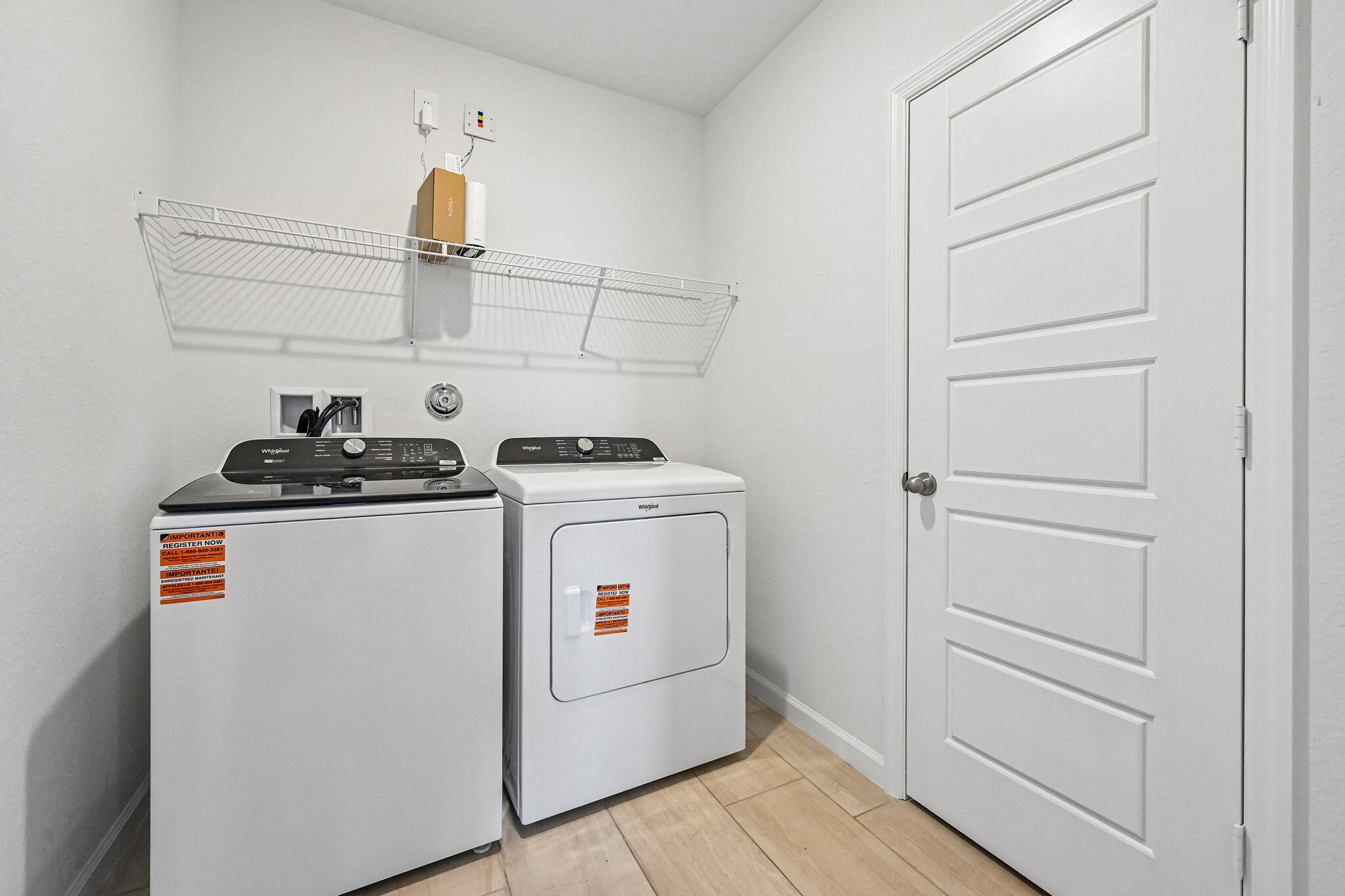 14503 Southwest New Dawn Road Indiantown, FL 34956 - Photo 25 of 42 a room with storage and utility