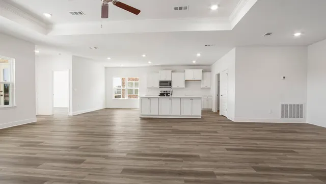 a view of kitchen with wooden floor