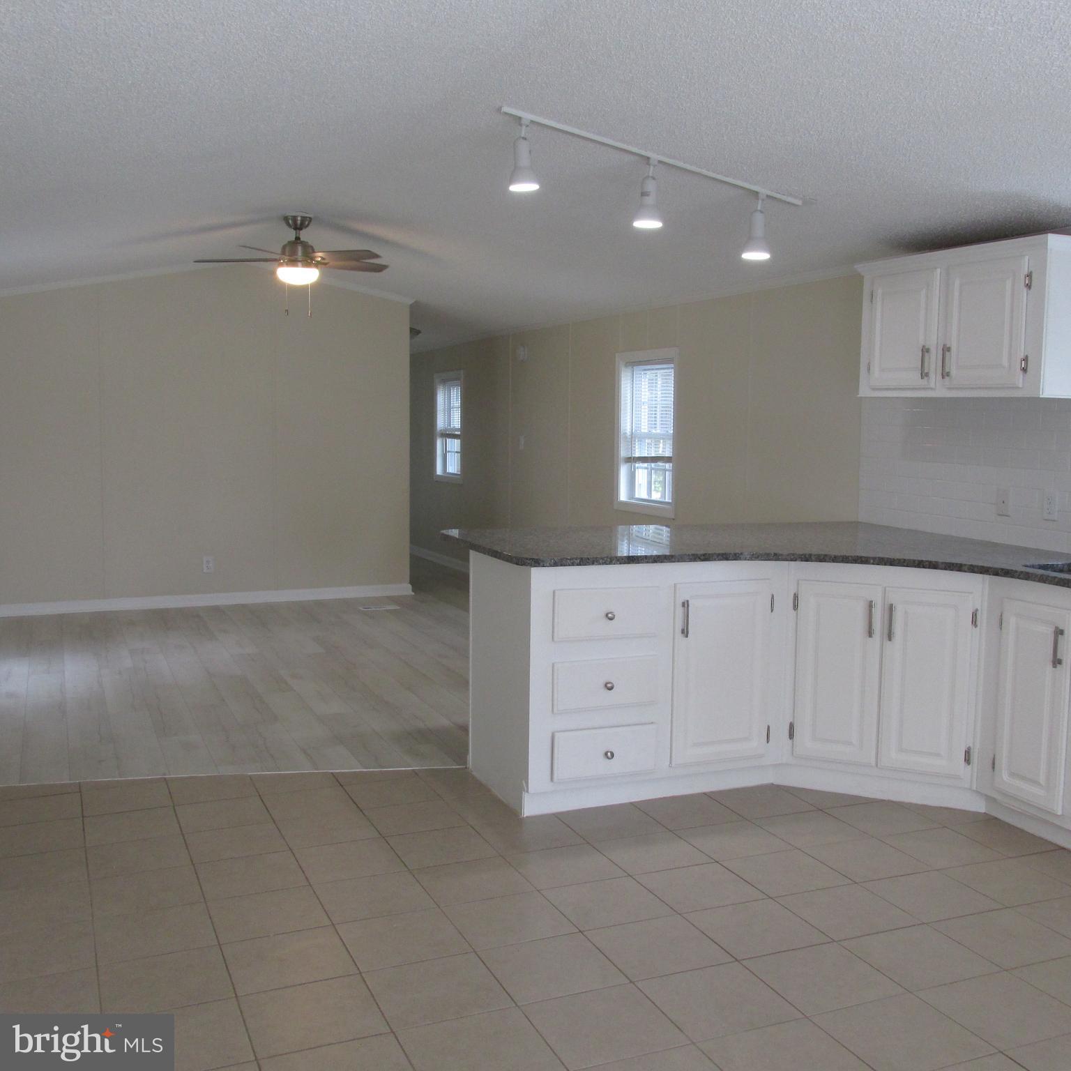 13 Abbey Road Coatesville, PA 19320 - Photo 8 of 14 Kitchen/Living Rooms