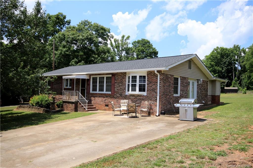 206 Partridge Road, Unit 9 & 11 Union, SC 29379 - Photo 1 of 21 a front view of a house with sitting area and garden