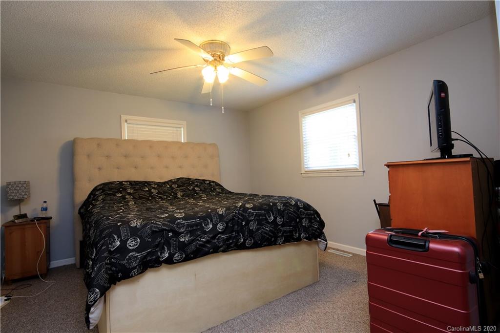 206 Partridge Road, Unit 9 & 11 Union, SC 29379 - Photo 12 of 21 a bedroom with a bed and a flat screen tv