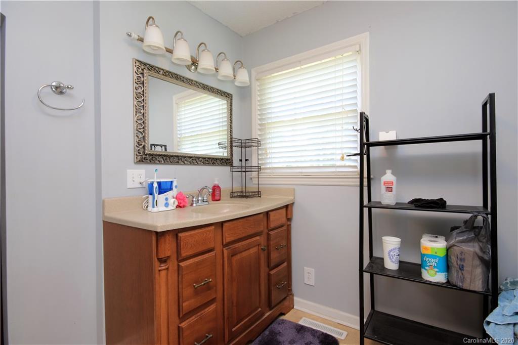 206 Partridge Road, Unit 9 & 11 Union, SC 29379 - Photo 14 of 21 a bathroom with a sink and a mirror