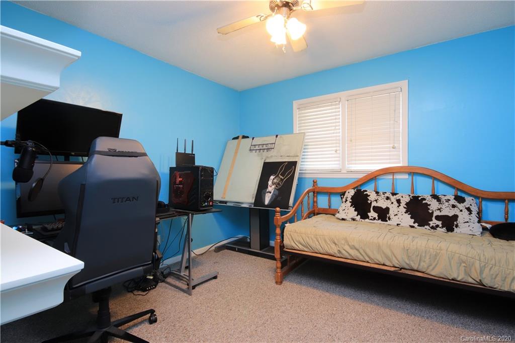 206 Partridge Road, Unit 9 & 11 Union, SC 29379 - Photo 15 of 21 a bedroom with a bed and a chandelier