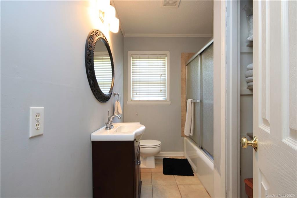 206 Partridge Road, Unit 9 & 11 Union, SC 29379 - Photo 17 of 21 a bathroom with a sink and a mirror