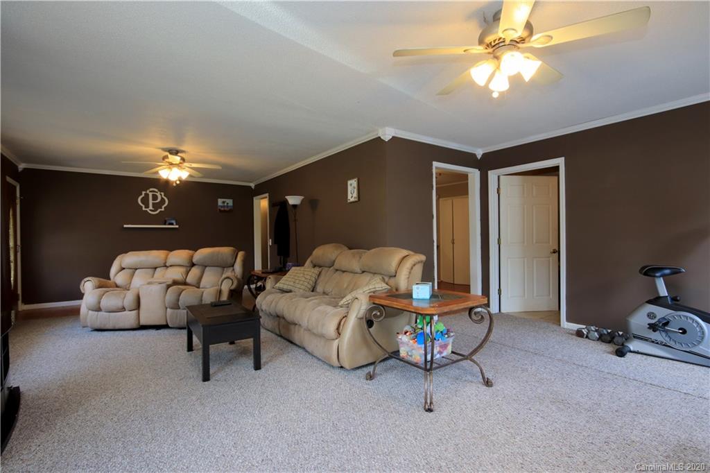 206 Partridge Road, Unit 9 & 11 Union, SC 29379 - Photo 6 of 21 a bedroom with furniture and a chandelier
