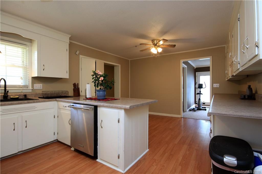 206 Partridge Road, Unit 9 & 11 Union, SC 29379 - Photo 10 of 21 a kitchen with a sink cabinets and wooden floor