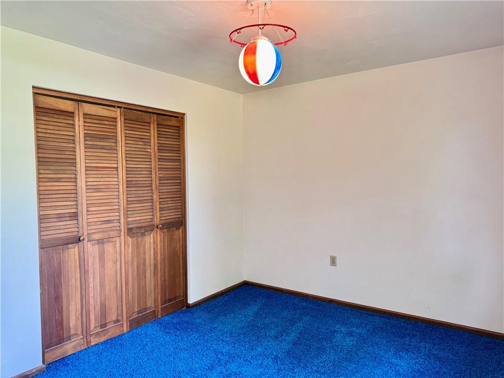 1142 Apples Mill Road West Newton, PA 15089 - Photo 18 of 27 an empty room with wooden floor and windows