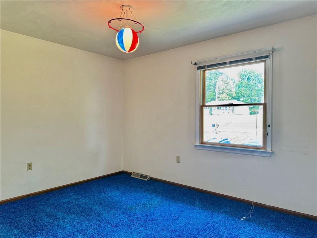1142 Apples Mill Road West Newton, PA 15089 - Photo 19 of 27 a view of a room with wooden floor and window