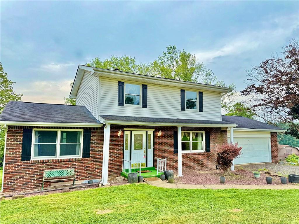 1142 Apples Mill Road West Newton, PA 15089 - Photo 2 of 27 front view of a house with a yard