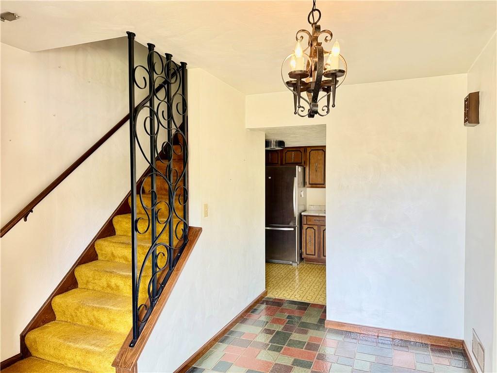 1142 Apples Mill Road West Newton, PA 15089 - Photo 3 of 27 a dining room with wooden floor