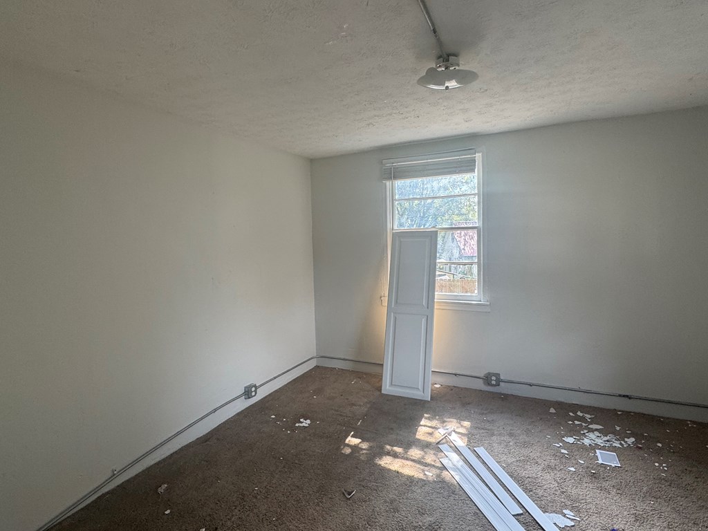 16 29th Street Columbus, GA 31904 - Photo 3 of 12 an empty room with windows
