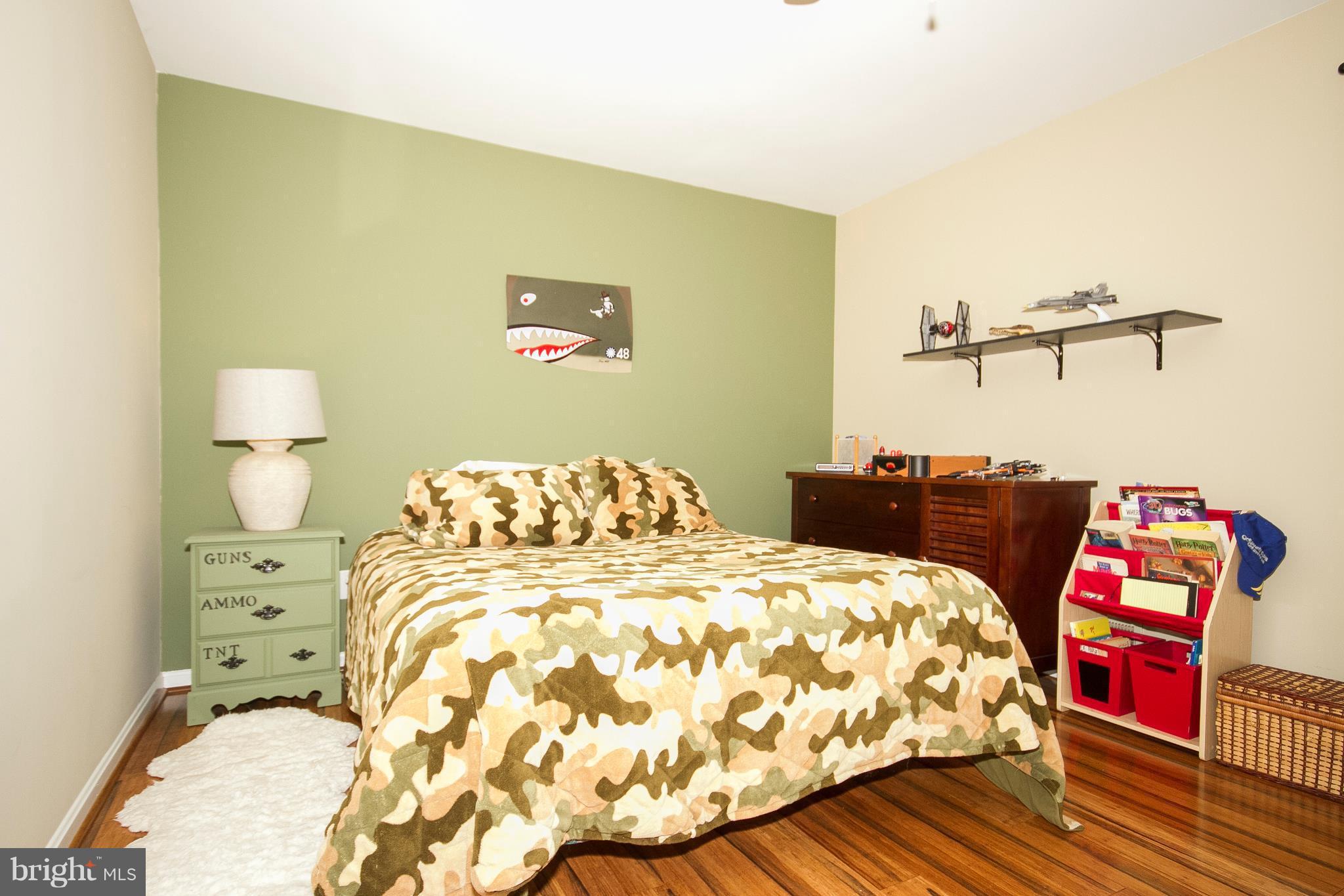 2902 York Manor Road Phoenix, MD 21131 - Photo 22 of 30 a bedroom with a bed and cupboard