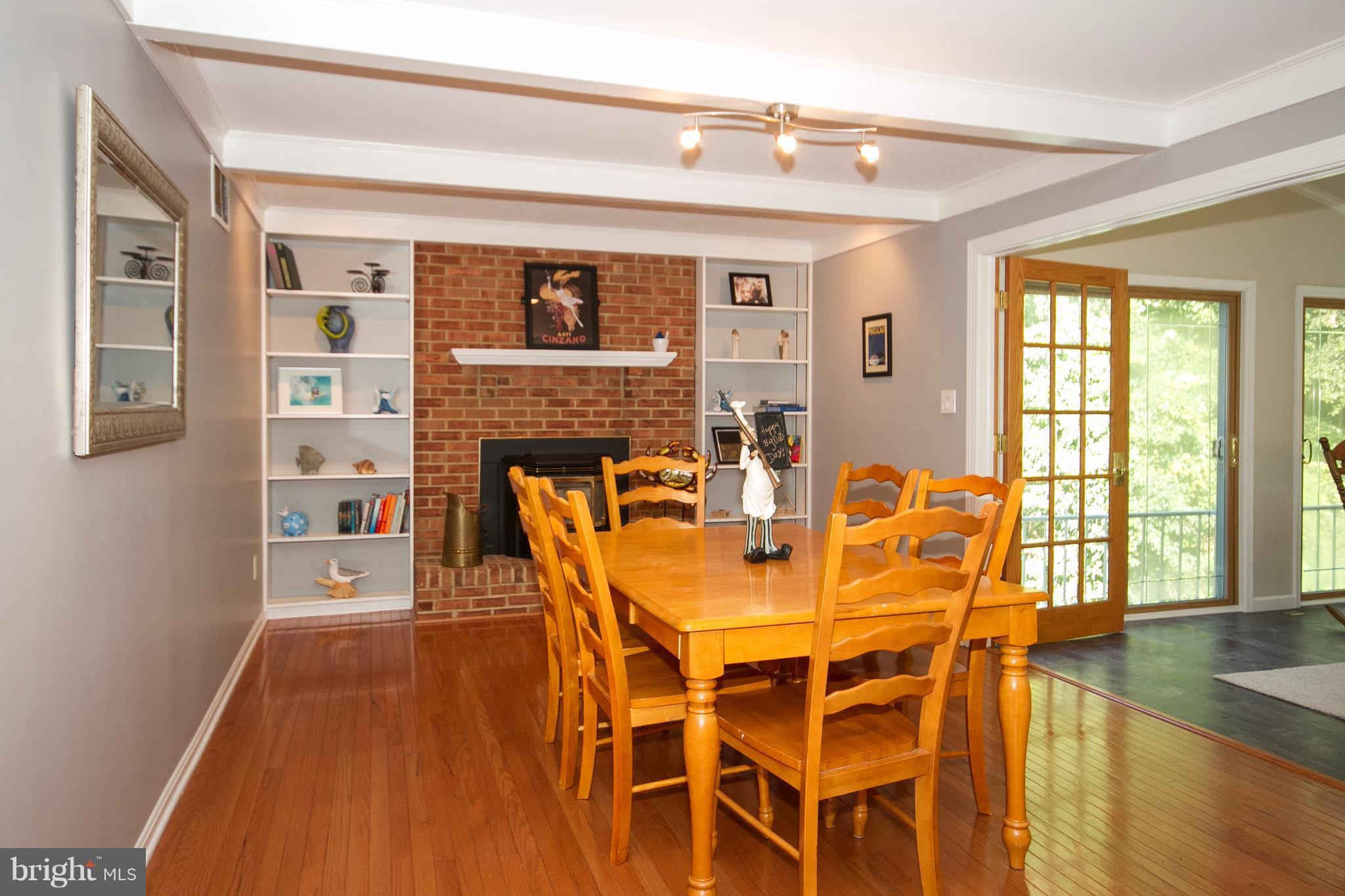2902 York Manor Road Phoenix, MD 21131 - Photo 8 of 30 a view of a dining room with furniture and wooden floor