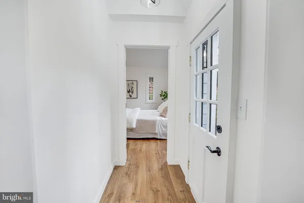 a view of a bedroom from the hallway