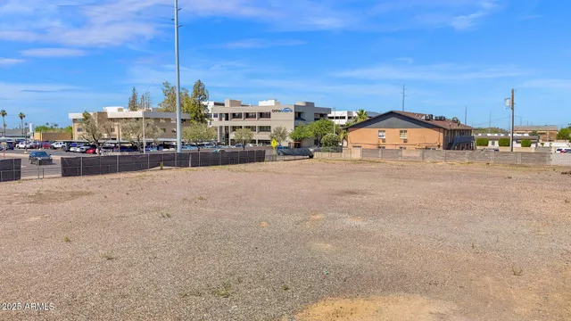 a view of a road with a house