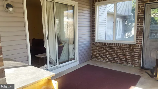 a room with window and a table