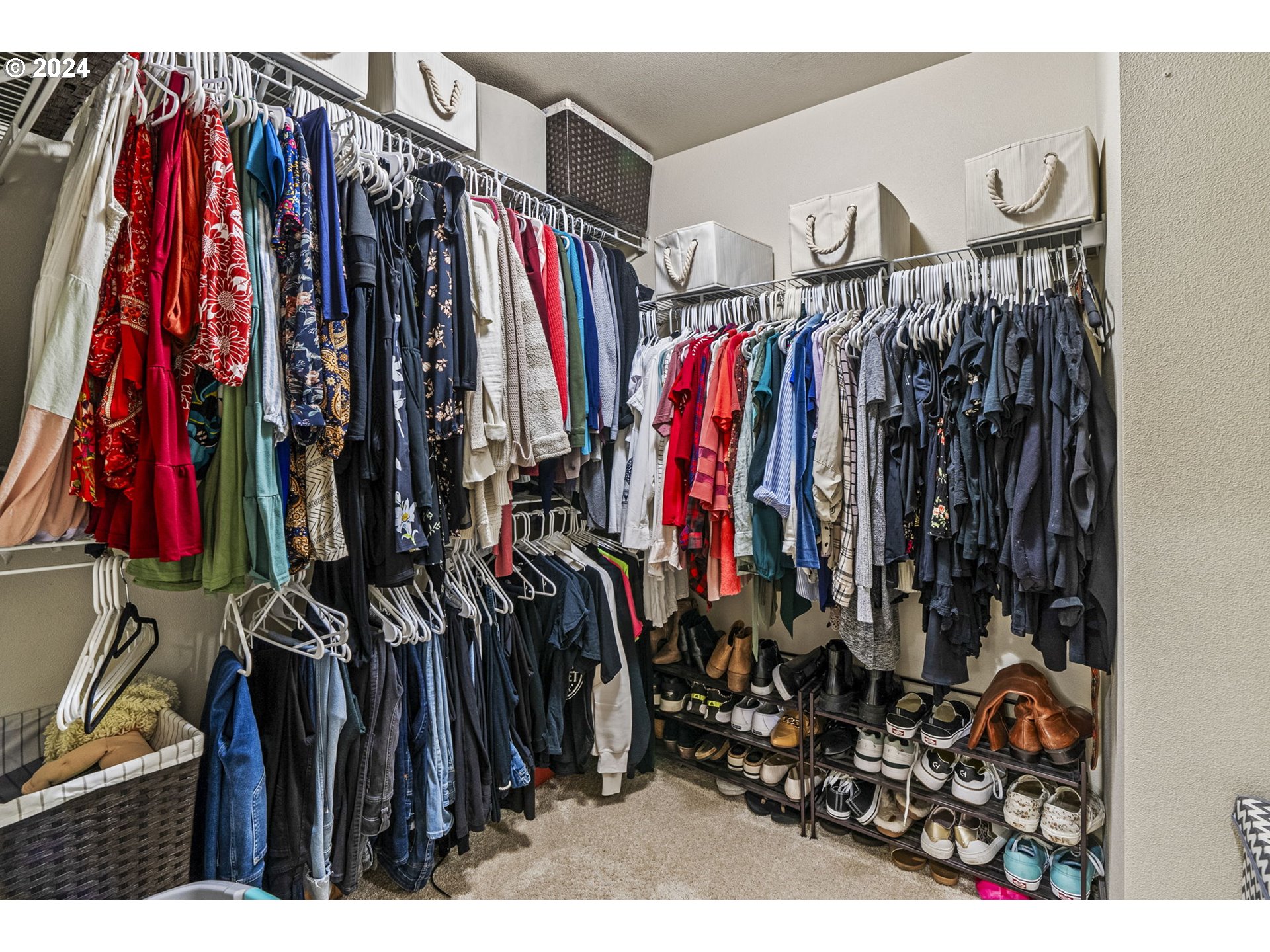 266 North Green Gables Loop Ridgefield, WA 98642 - Photo 24 of 37 a view of walk in closet with clothes