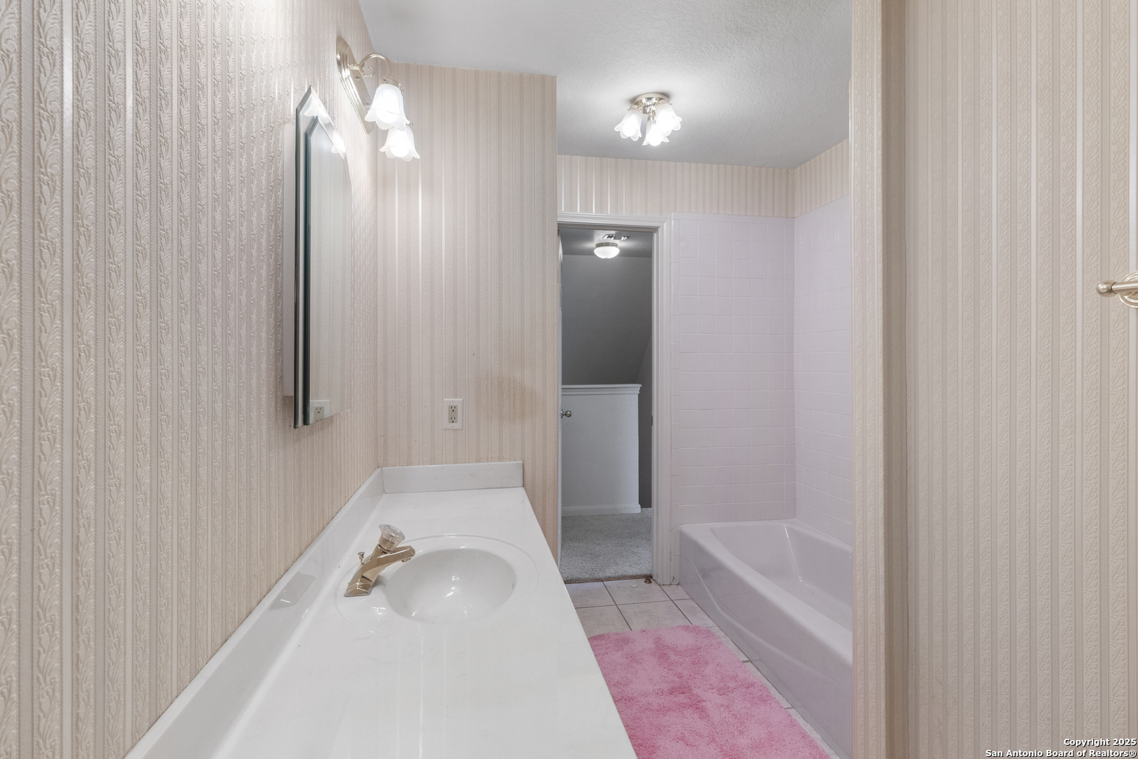 369 Deer Valley Bandera, TX 78003 - Photo 17 of 34 a bathroom with a tub shower and sink