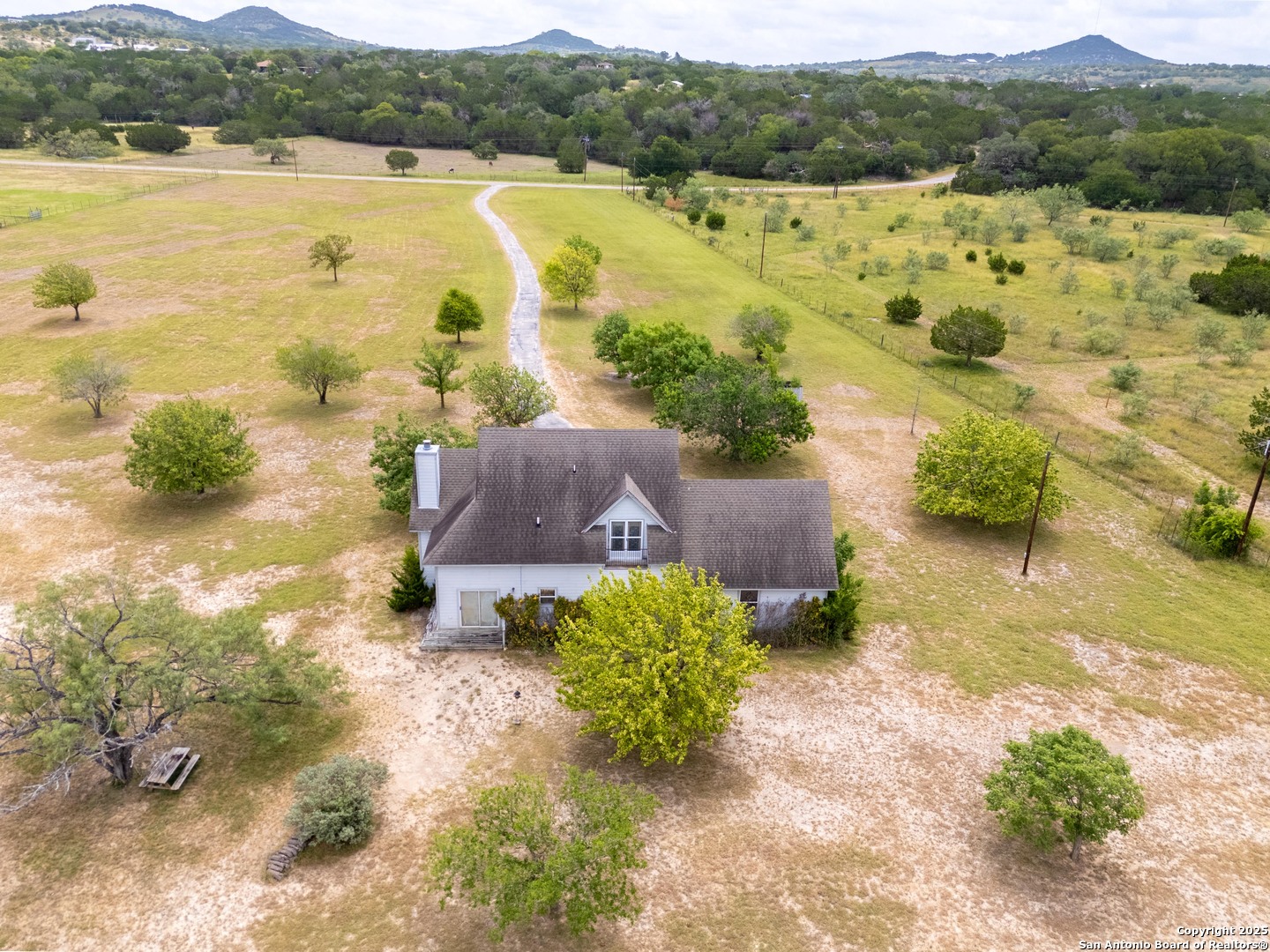 369 Deer Valley Bandera, TX 78003 - Photo 33 of 34 a view of a lake with mountain