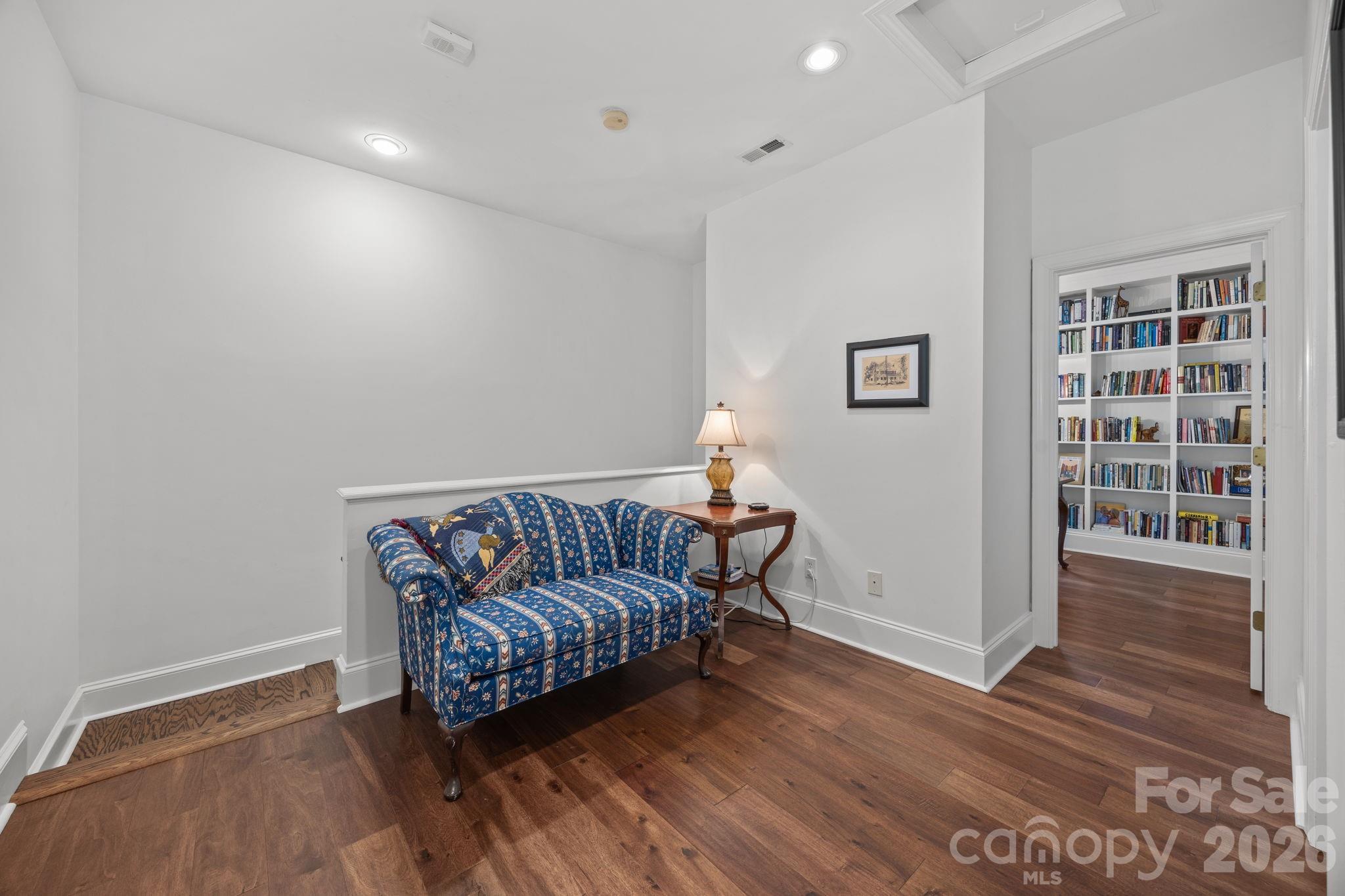 233 Twain Avenue Davidson, NC 28036 - Photo 19 of 35 a living room with furniture and a wooden floor