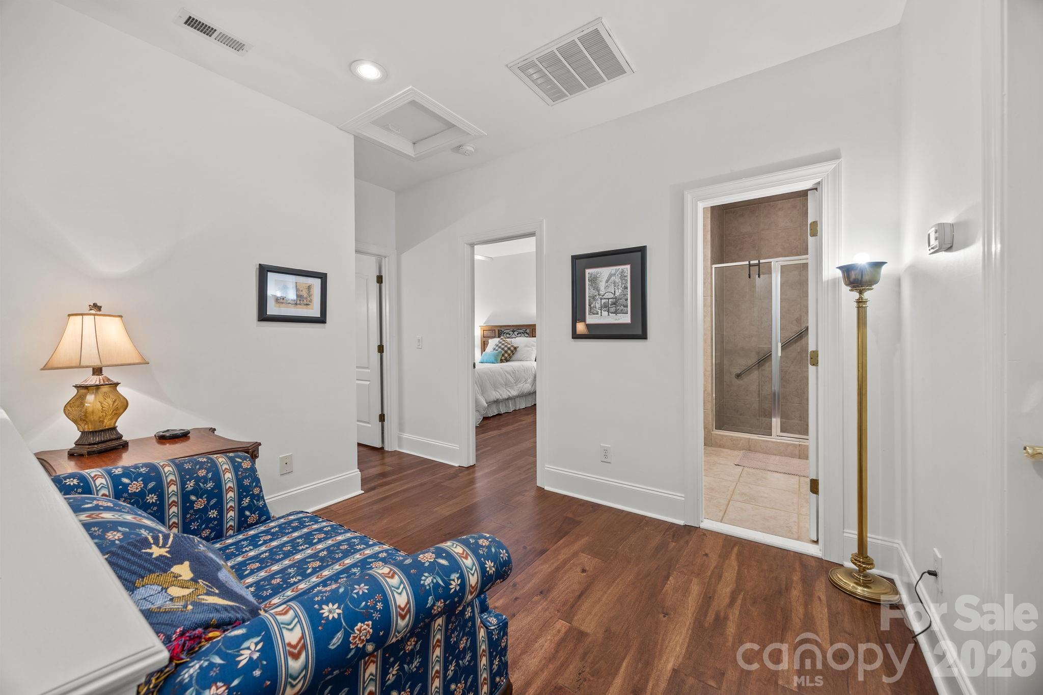 233 Twain Avenue Davidson, NC 28036 - Photo 20 of 35 a bedroom with furniture and wooden floor