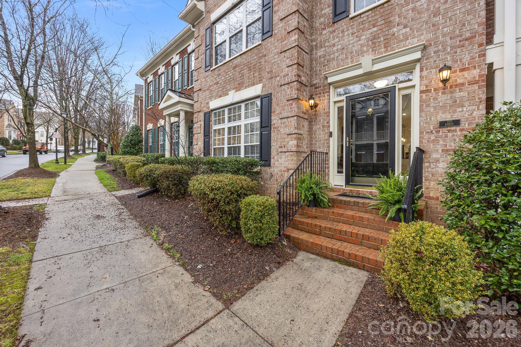 233 Twain Avenue Davidson, NC 28036 - Photo 2 of 35 a view of a building with garden