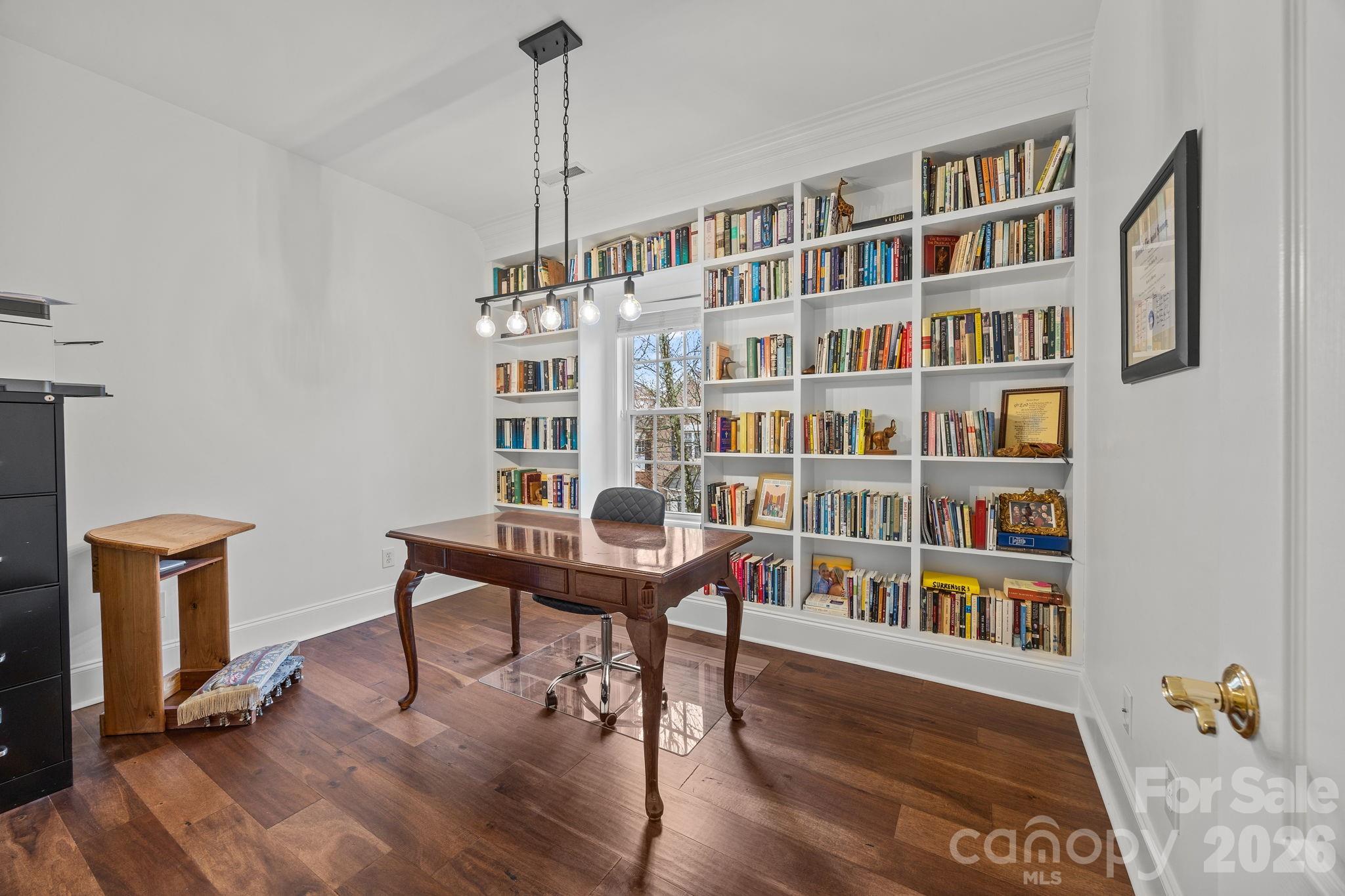 233 Twain Avenue Davidson, NC 28036 - Photo 21 of 35 a view of a workspace with furniture window and wooden floor