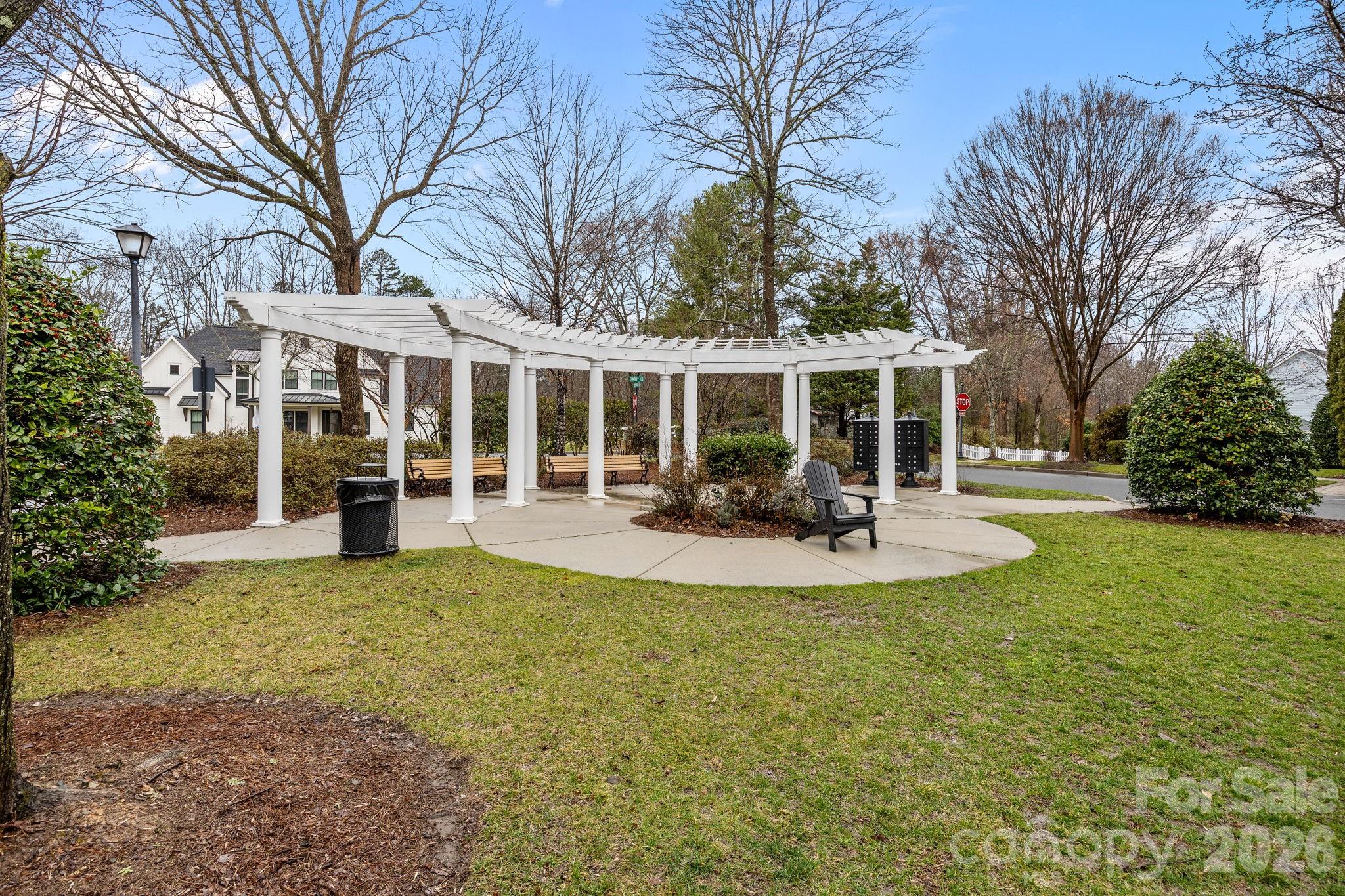 233 Twain Avenue Davidson, NC 28036 - Photo 28 of 35 a view of a house with a backyard porch and sitting area